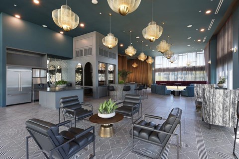 A modern living room with a dining table and chairs.